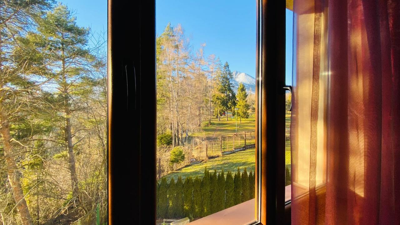 Mountain and forest view through the apartment window